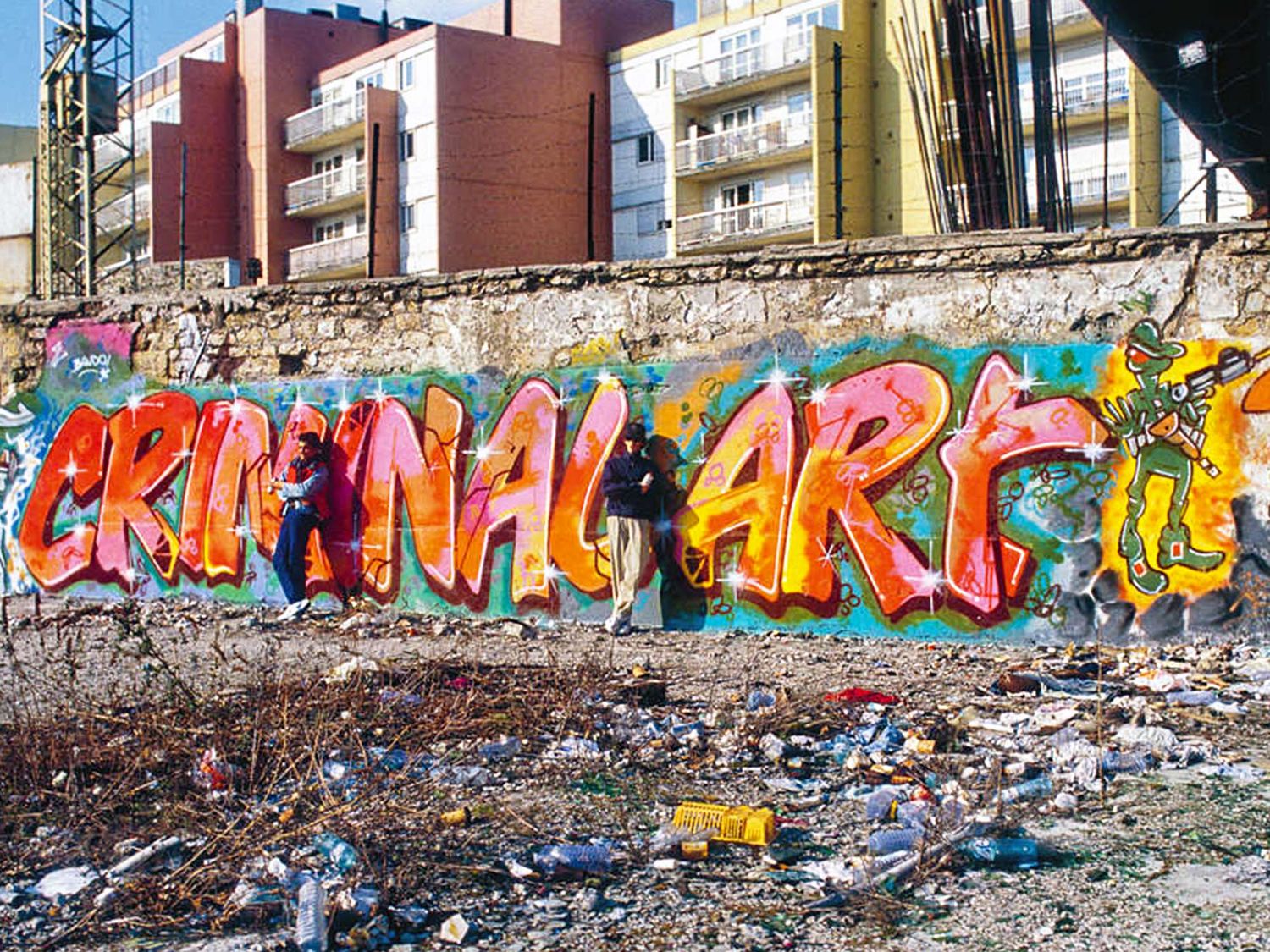 Done at the end of the eighties by Bando and Mode2, “Criminal Art” is probably the most iconic graffiti mural from the era of the wasteland of Stalingrad-La Chapelle in Paris (©Claude Abron).