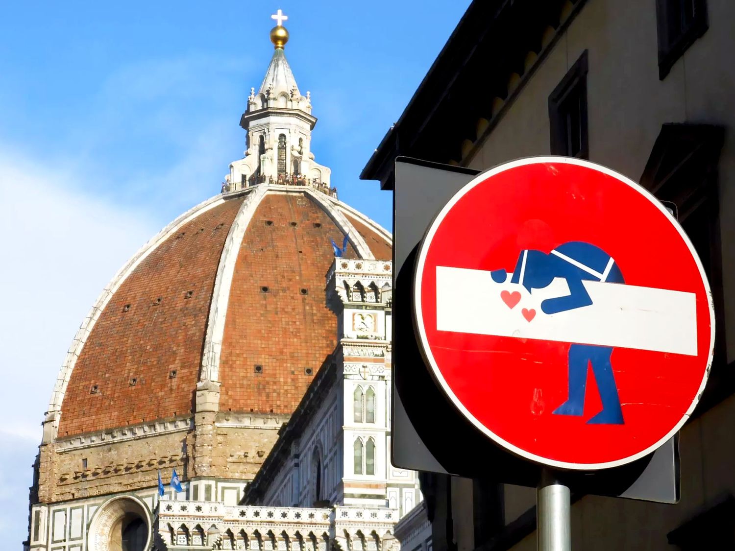 Initiated by the artist Clet Abraham, hijacking road signs is a practice that reinterprets urban signage in using stickers as a way to directly interact with passers-by in the streets (©Clet Abraham).