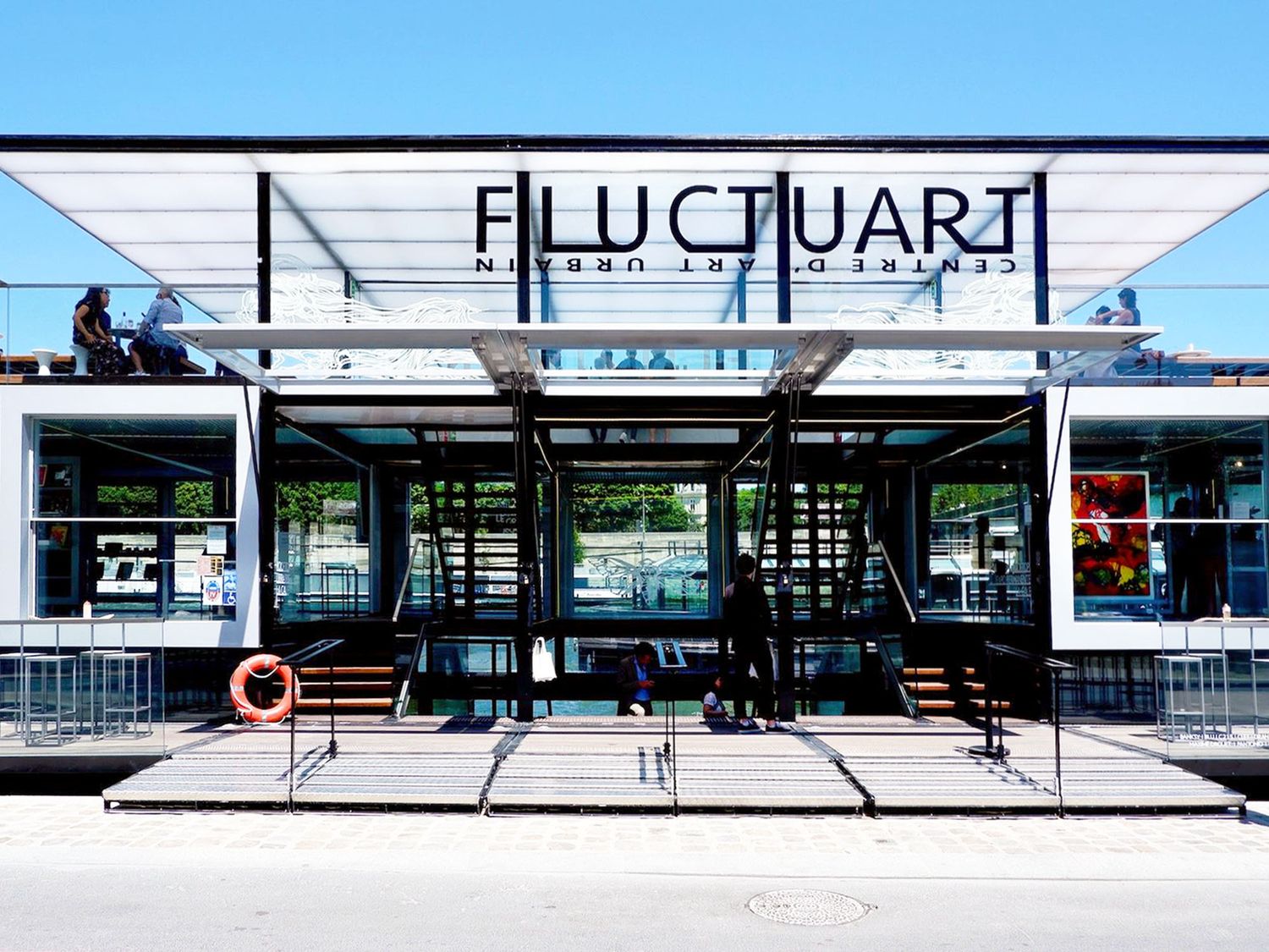 Described as an Urban Art center, Fluctuart showcases artworks from established to emerging artists within a design setting that provides a place for art, life and celebration (@Ali Postma).